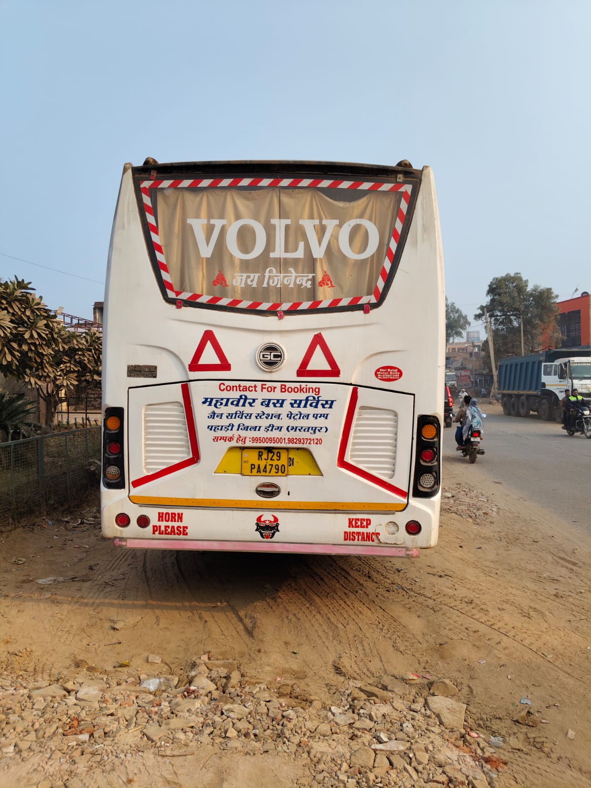 Rear of the coach with booking contact details