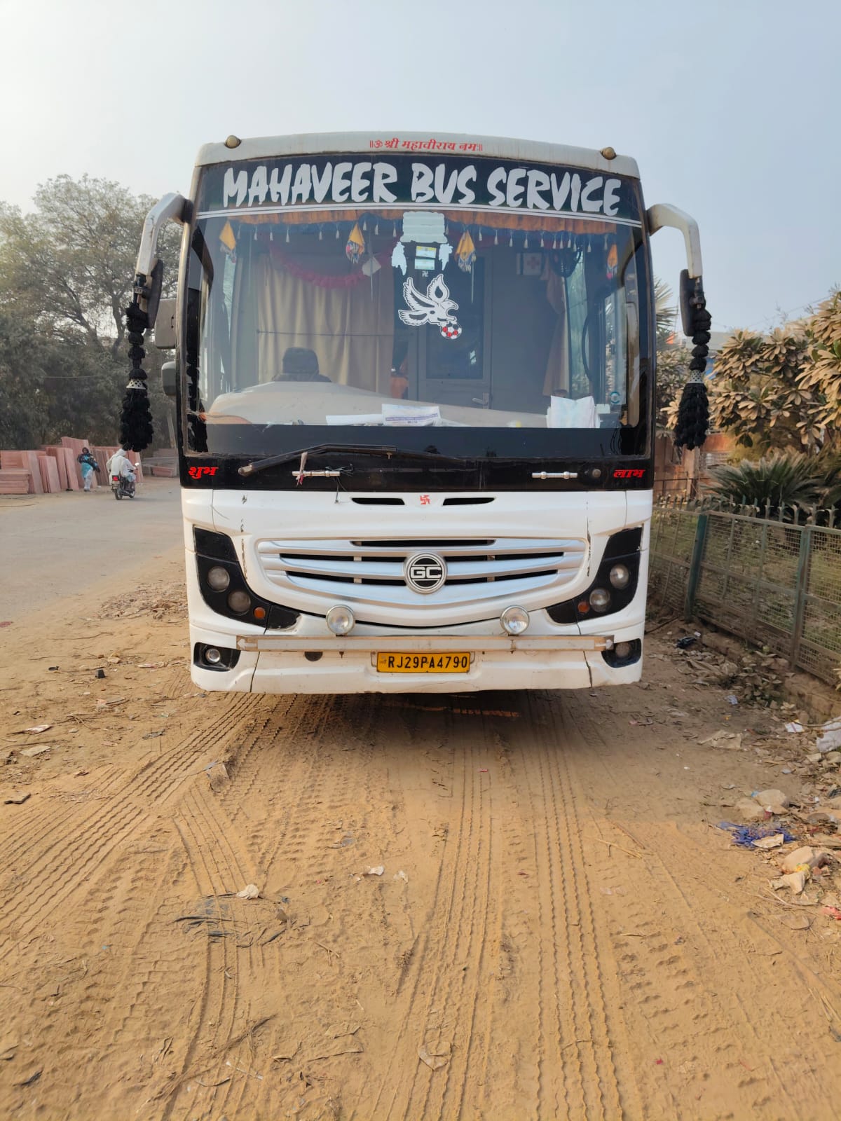 Front view of the coach with Mahaveer Bus Service signage